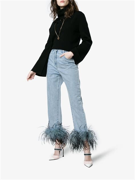 prada jeans with feather